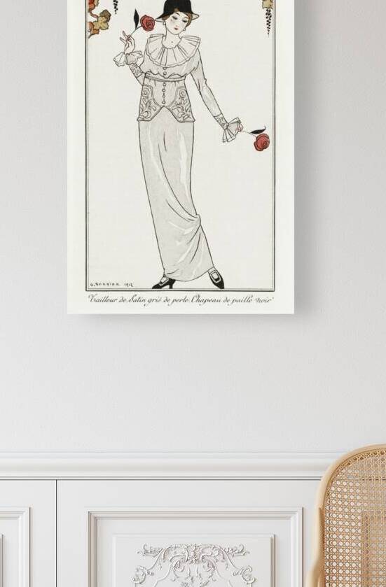 Costumes Parisiens no. 8: Tailleur de Satin gris de perle. Chapeau de paille noir from Journal des Dames et des Modes 1912 fashion illustration  by George Barbier.  by IStockHistory com